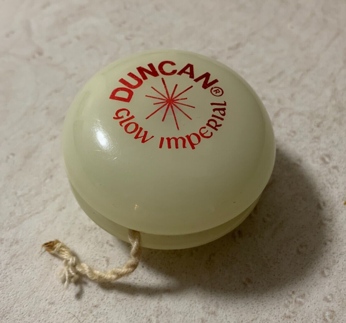 A creamy coloured Duncan Imperial Yo-Yo which glows in the dark