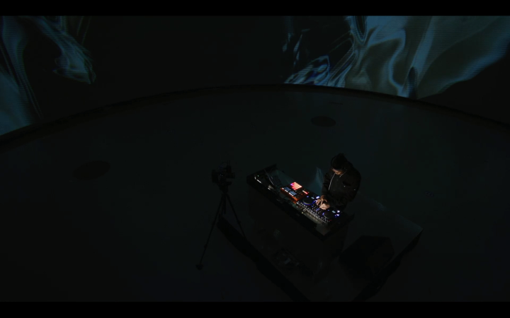 a wide shot of Kaytranada performing a DJ set