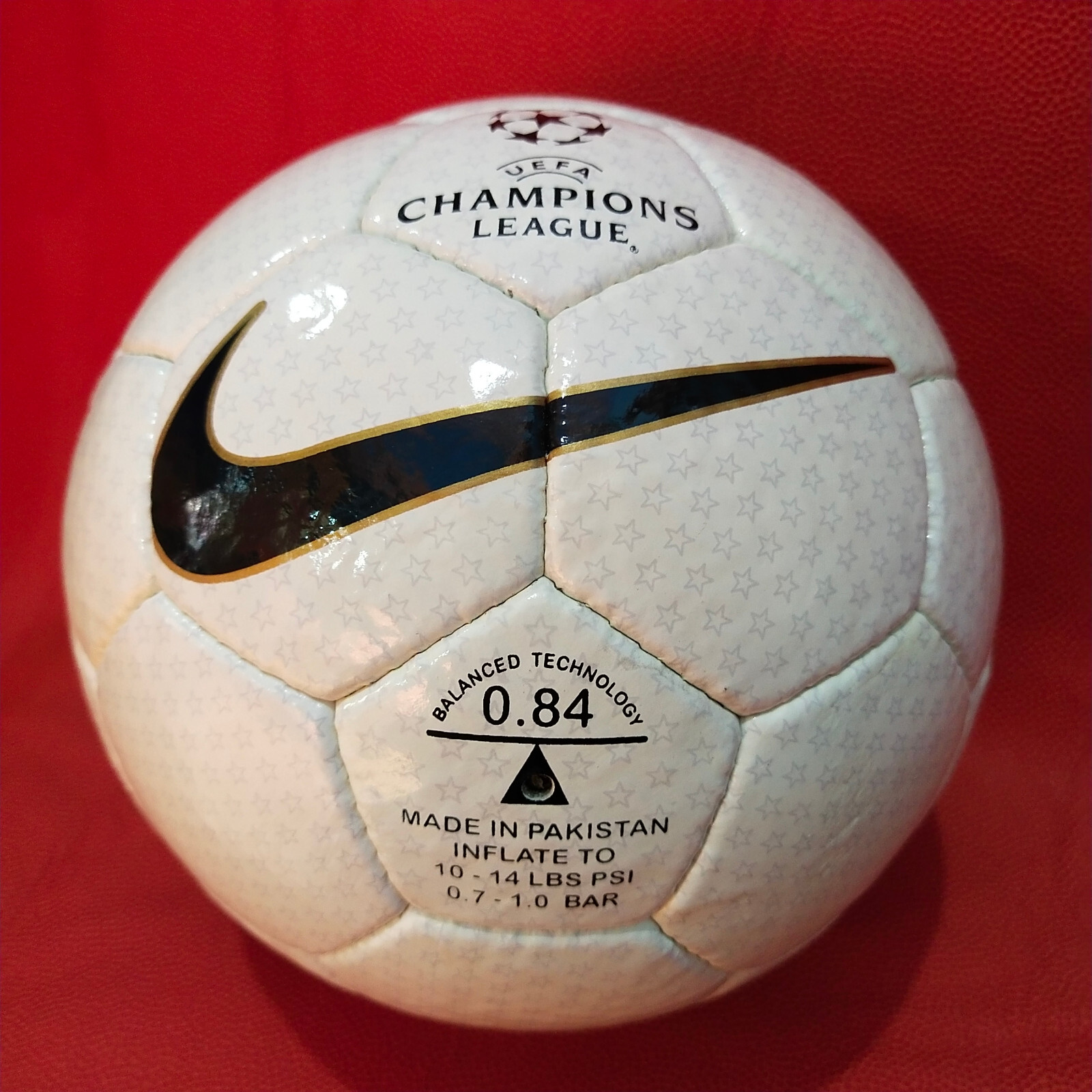 a white football with a black Nike tick on it